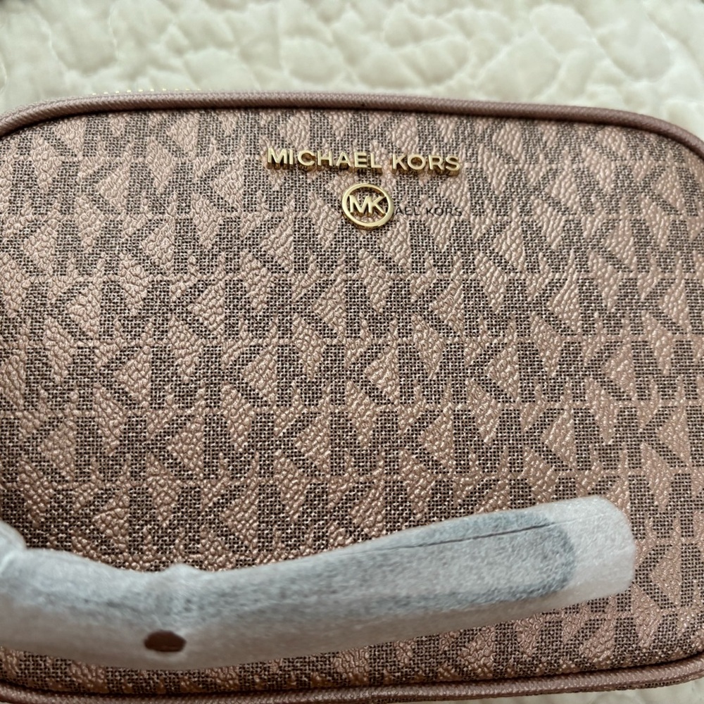 Michael Kors rose gold double zip wristlet, cosmetic bag